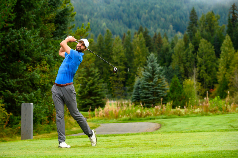 man paying golf